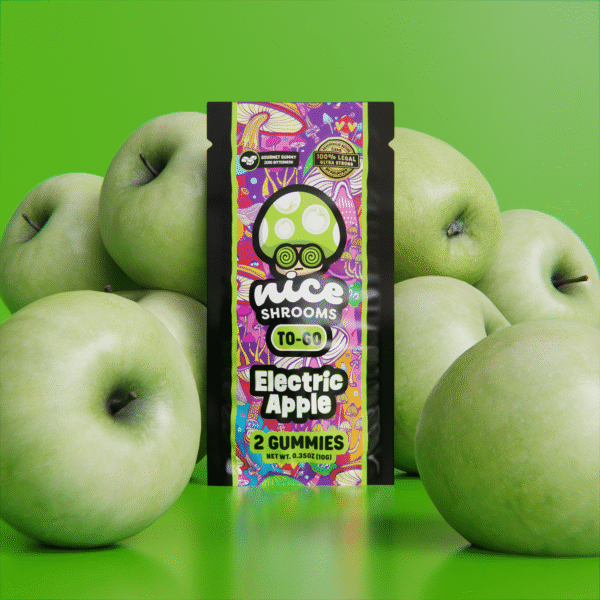 apple mushroom gummies to-go edition on a green background surrounded by apples