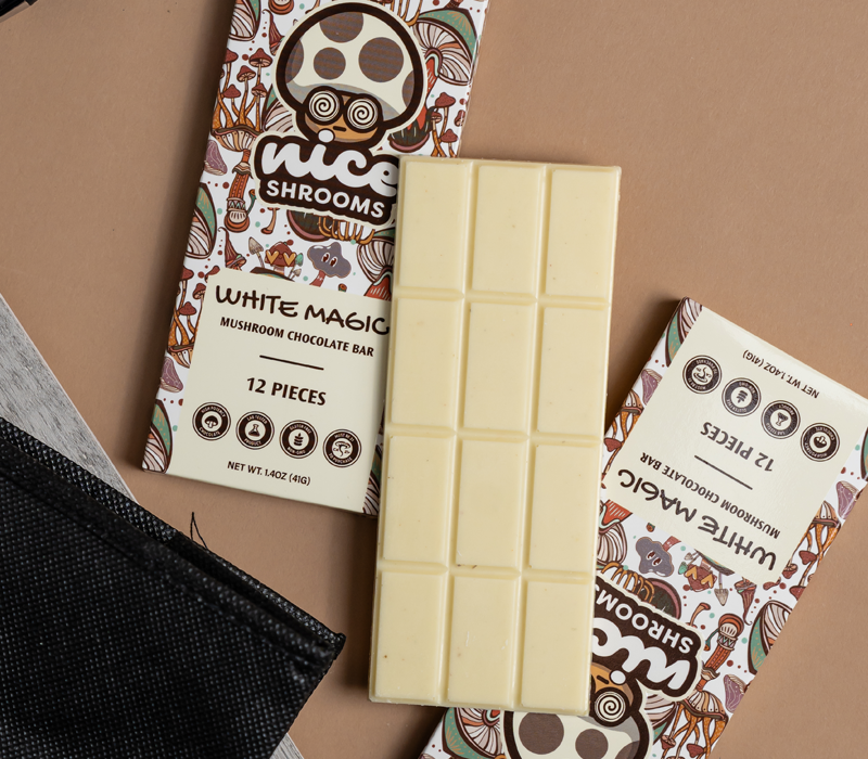 white magic mushroom chocolate on a brown background