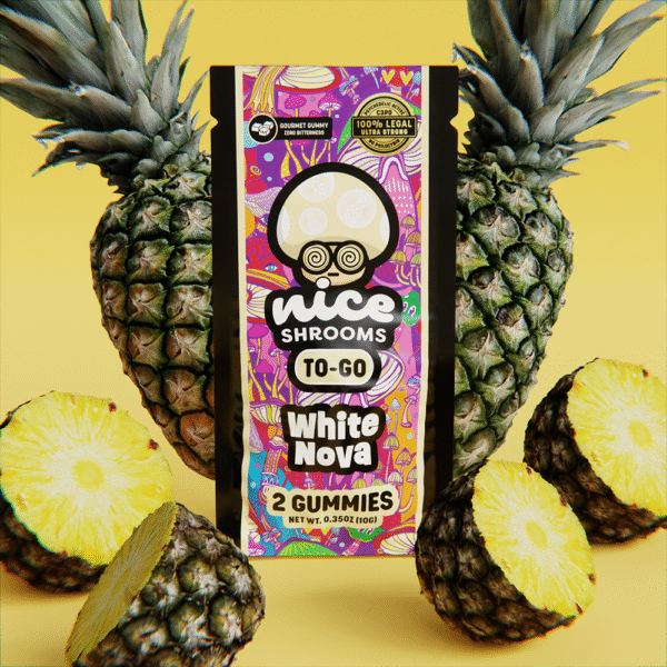 white nova mushroom gummies on a yellow background surrounded by pineapples